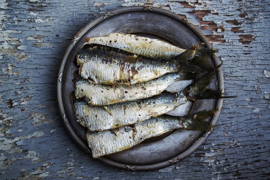 A seafood dish plated and ready to serve